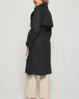 Stay stylish with our black trench coat – the perfect blend of elegance and practicality. Ideal for any occasion