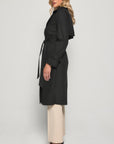 Transform your look with our chic black trench coat. Stylish, durable, and perfect for all seasons. Grab yours today and make a statement. Shop now!