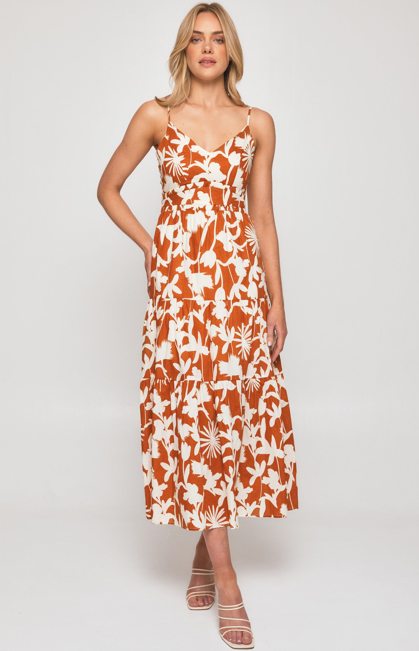 Step out in confidence with our mocha cotton strap dress. Flattering fit, breathable fabric, and timeless style.