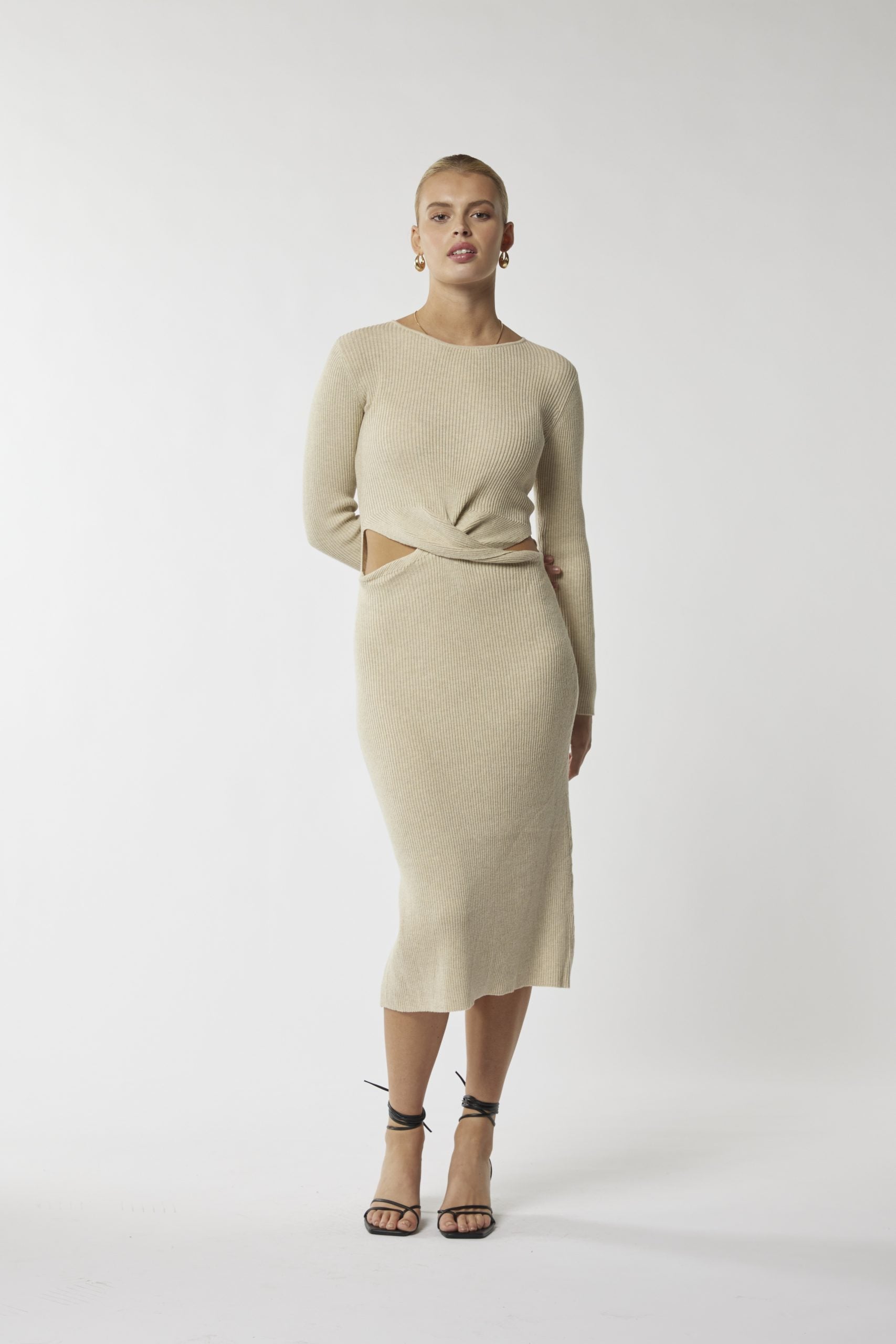 Flaunt elegance: Beige cut-out midi dress. Perfect fit, timeless charm. Shop now!
