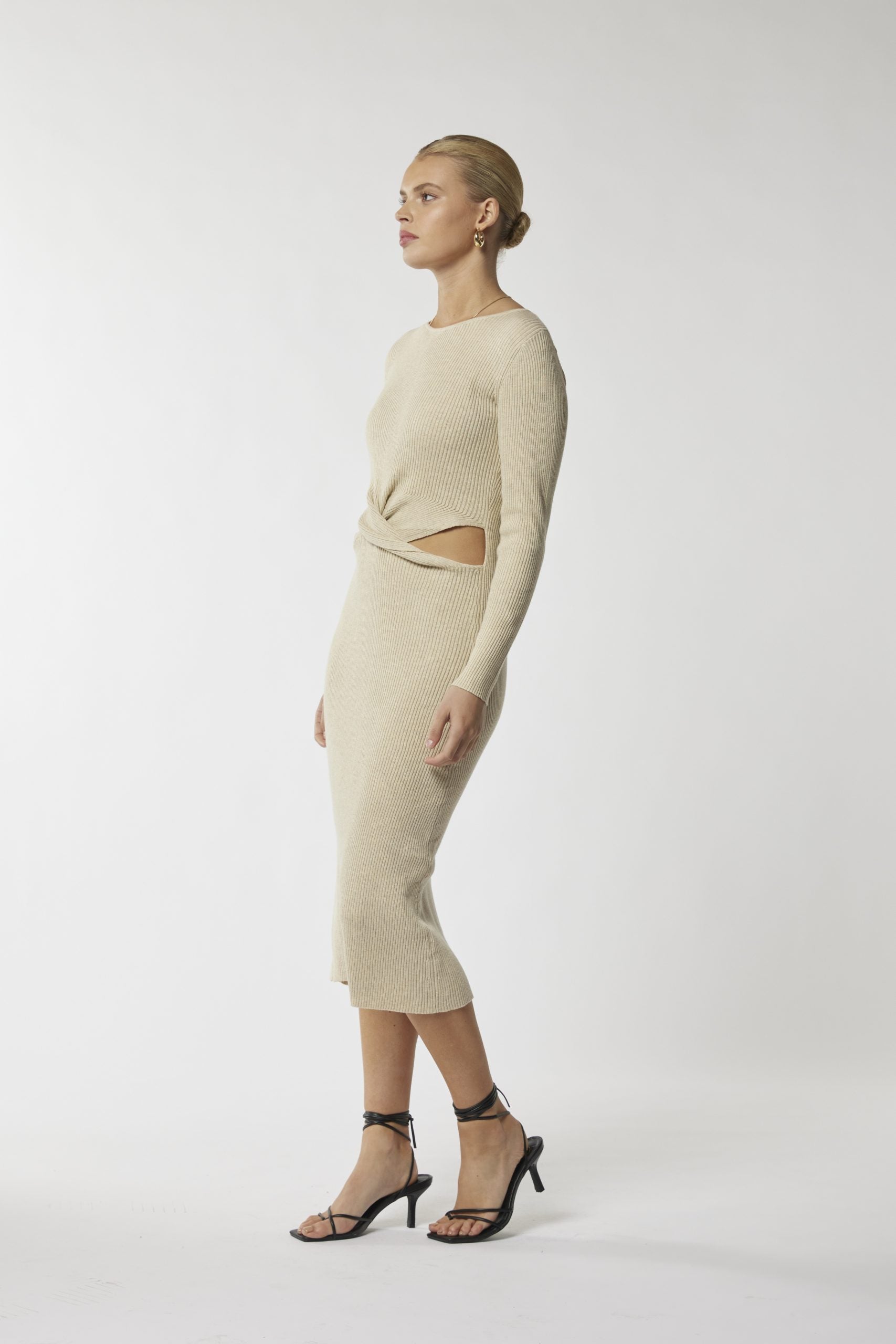 Embrace elegance: Beige cut-out waist midi dress. Elevate your wardrobe.