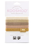 Upgrade your hair game with our eco-conscious beige Kooshoo hairbands. Experience comfort and elegance effortlessly.