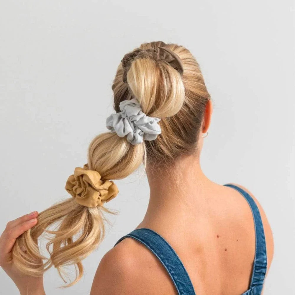 Transform your hair game with Kooshoo's eco-friendly hair scrunchie. Elevate your style sustainably. Shop now!