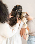 Experience the difference with Kooshoo organic hair ties. Ethically made for your hair's health.