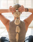 Unleash your hair's potential with Kooshoo organic hair ties. Natural, non-toxic, and chic.