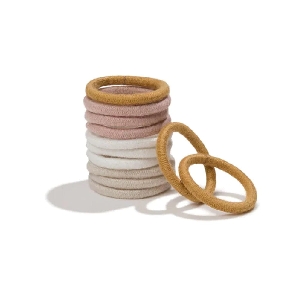 Upgrade your hair game with Kooshoo hair ties. Unleash your inner style icon with secure, chic, and sustainable accessories