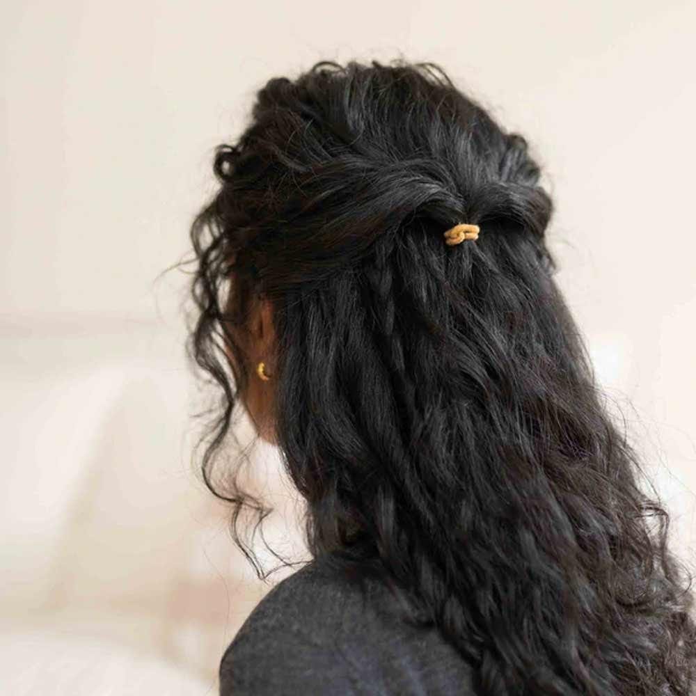 Embrace effortless elegance with Kooshoo hair ties. Say yes to comfort, style, and versatility in every twist. Elevate your look now!