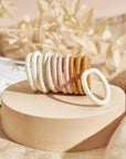 Style your hair with confidence using Kooshoo hair ties. Enjoy the perfect balance of comfort, hold, and elegance. Try them today!