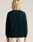Wrap yourself in luxury: Peacock green merino wool jumper, warmth meets style!
