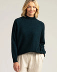 Indulge in comfort and elegance with our peacock green merino wool jumper.