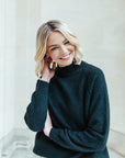 Upgrade your knitwear game with our irresistibly soft peacock green jumper.