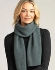Discover warmth and sophistication with our feather grey merino wool ribbed scarf. Perfect for effortless winter chic.