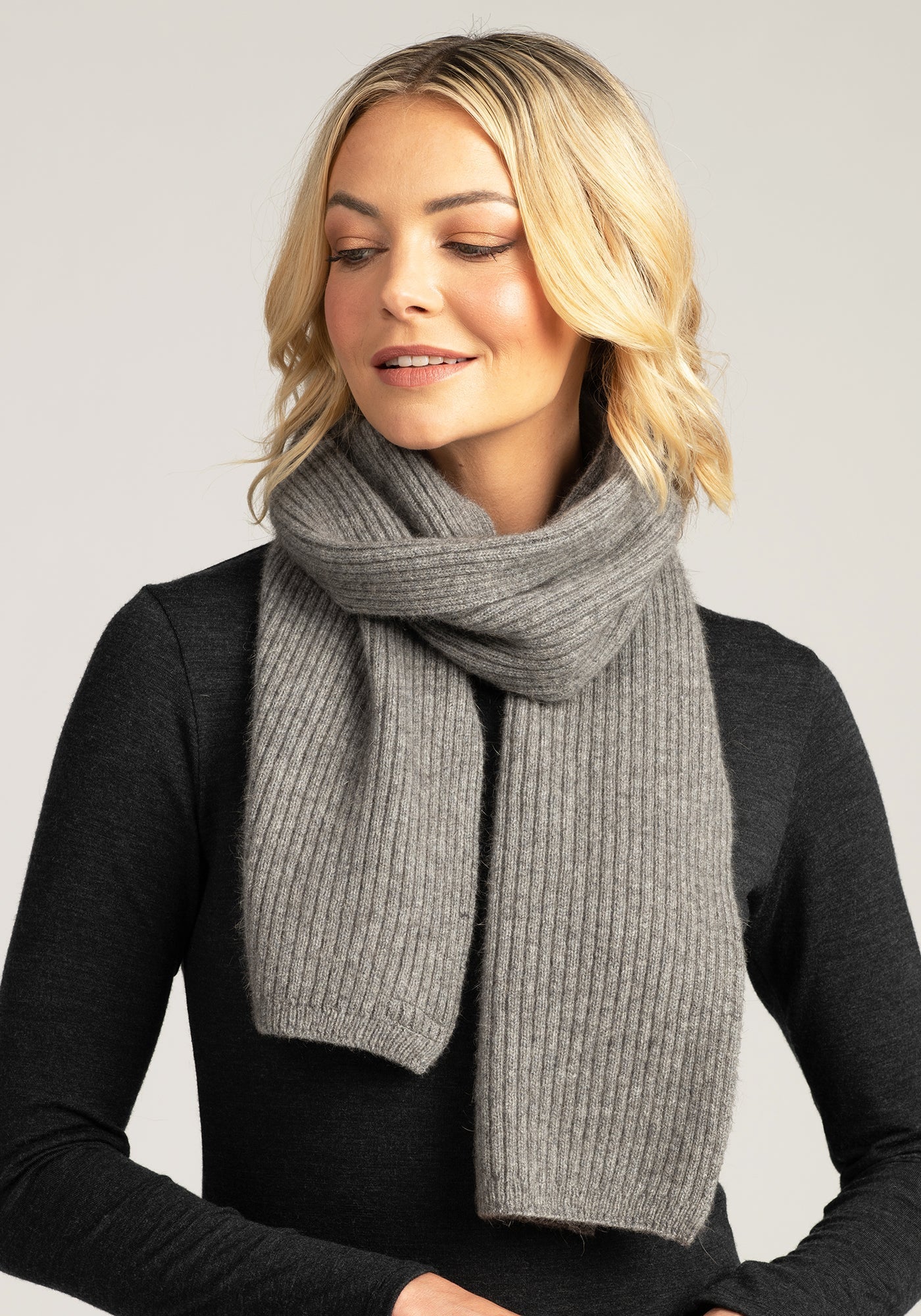 Elevate your winter style with our grey merino wool ribbed scarf. Cozy warmth meets timeless elegance. Buy yours today!