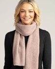 Experience ultimate comfort with our blush merino wool ribbed scarf. A must-have accessory for any wardrobe. Shop now!