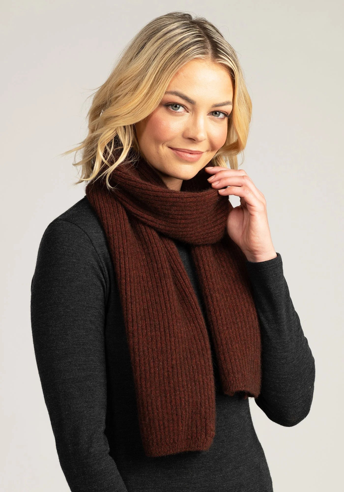 Wrap up in luxury with our rust-hued merino wool scarf. Soft, stylish, and perfect for chilly days. Shop now!
