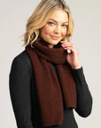 Wrap up in luxury with our rust-hued merino wool scarf. Soft, stylish, and perfect for chilly days. Shop now!