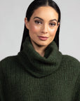 Stay cozy in style with our green merino wool snood. Perfect for any chilly day, versatile and chic.