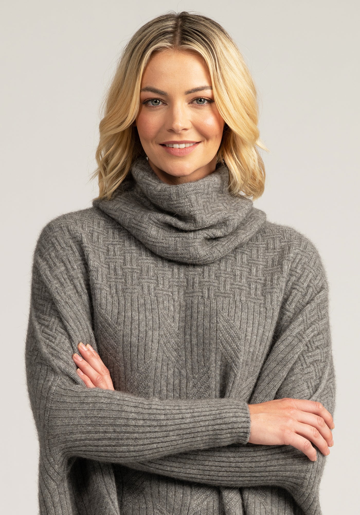Elevate your winter wardrobe with our grey merino wool snood. Soft, sustainable, and irresistibly snug.