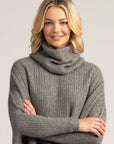 Elevate your winter wardrobe with our grey merino wool snood. Soft, sustainable, and irresistibly snug.
