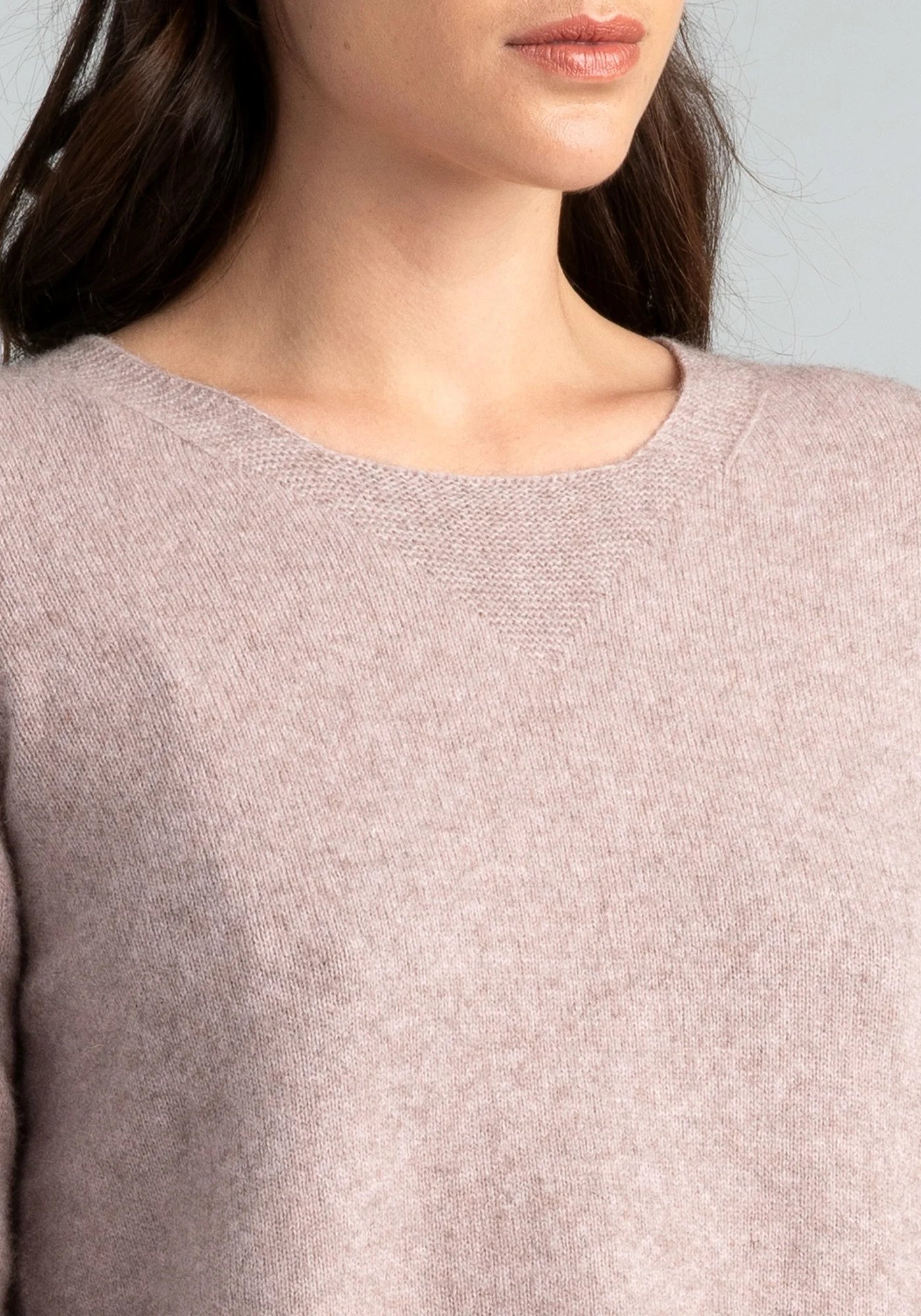 "Elevate your wardrobe with our light blush pink merino wool sweater. Unbeatable comfort, unmatched style."