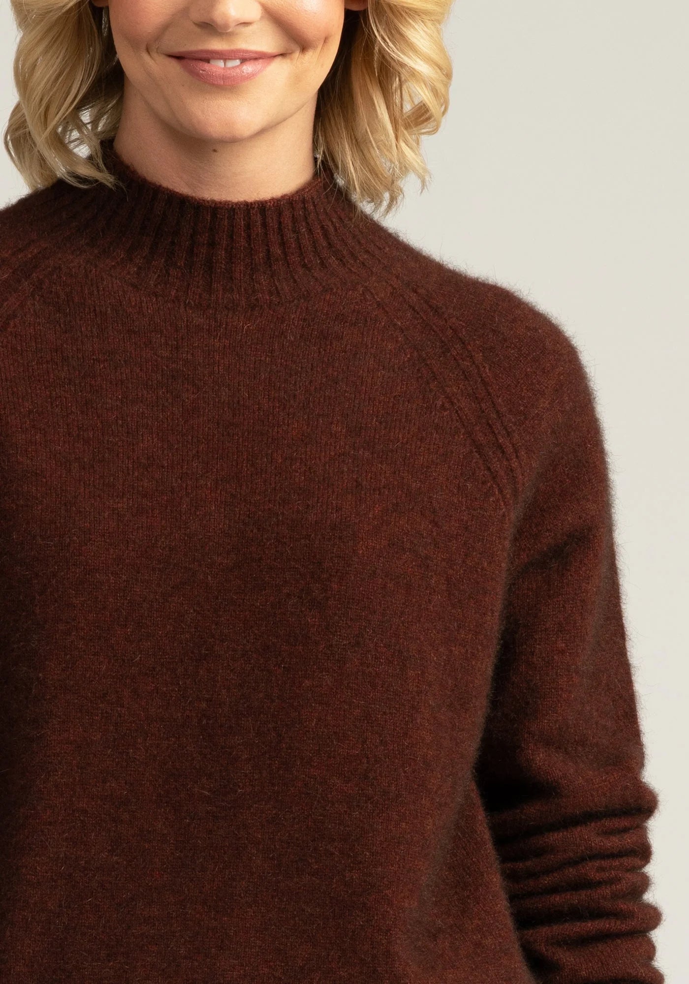"Wrap yourself in comfort with our rust merino sweater. Perfect blend of style and coziness. Order today!"