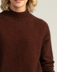 "Wrap yourself in comfort with our rust merino sweater. Perfect blend of style and coziness. Order today!"