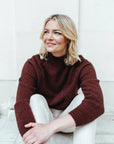 "Discover the allure of our rust merino wool sweater. Soft, stylish, and irresistible. Shop today!"