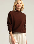 "Stay cozy and chic in our rust merino sweater. Premium wool for enduring style. Get yours now!"