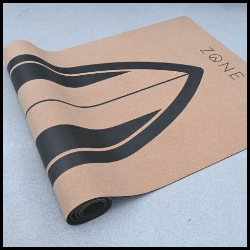 "Eco-friendly cork yoga mat for surfers: Soft top surface and super grip non-slip base ensure a secure practice."
