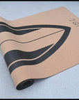 "Eco-friendly cork yoga mat for surfers: Soft top surface and super grip non-slip base ensure a secure practice."