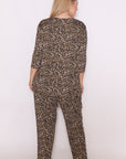 Roar with style in our plus-size soft cotton leopard print top. Comfortable, trendy, and perfect for any look. Buy now for a fashion upgrade!