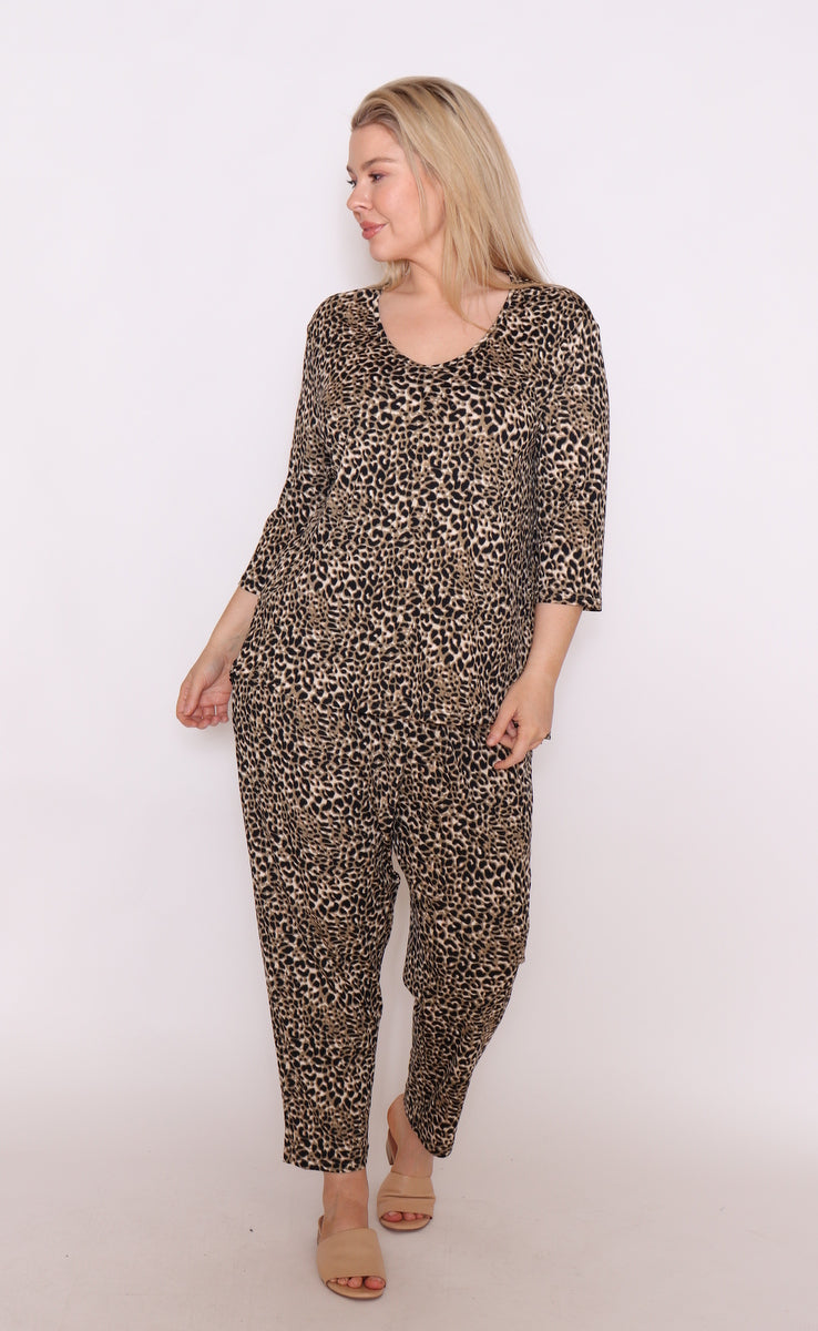 Embrace bold fashion with our plus-size leopard print top and pant. Made from soft cotton for all-day comfort & style. Get yours today!