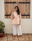 Elegant caramel floral cotton top with a relaxed fit, vintage block print, and adjustable cord, perfect for effortless everyday style.