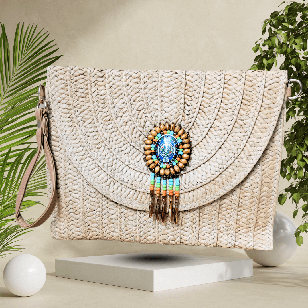 Handmade straw clutch bag featuring a vibrant woven design, detachable strap, and magnetic closure, offering style and sustainability.