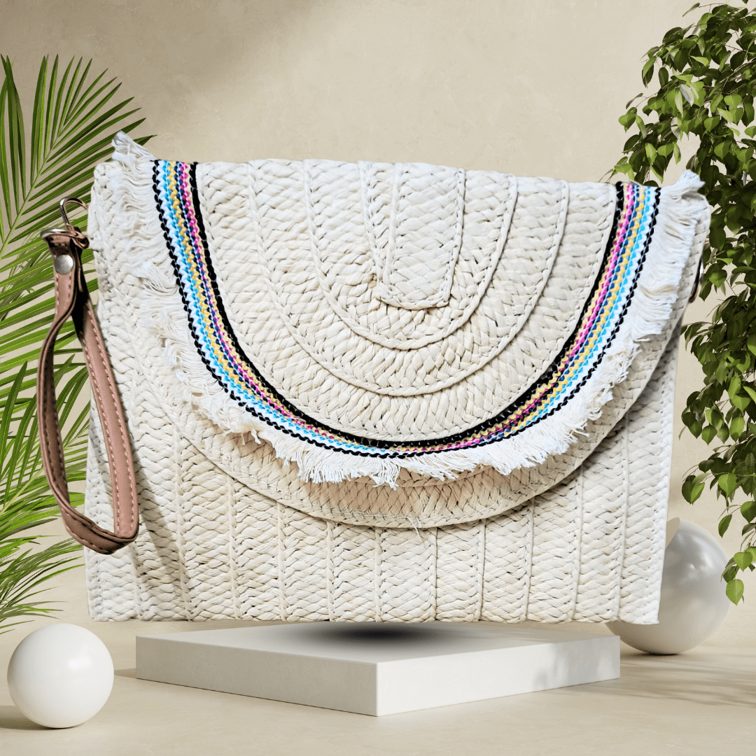 Sustainable straw clutch with detachable strap, woven design, and magnetic closure, offering a chic blend of fashion and eco-friendliness.