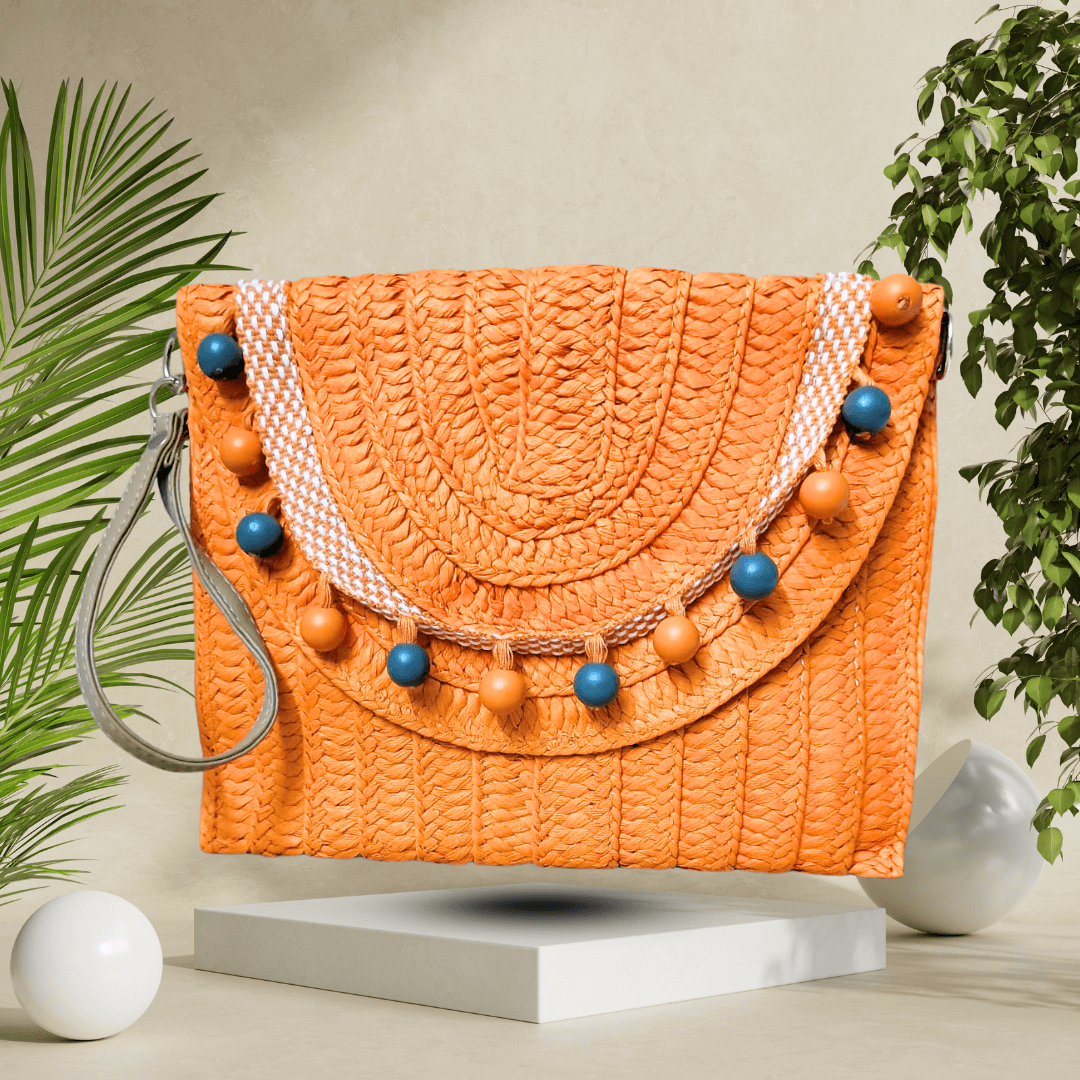 Chic woven straw clutch with a magnetic closure, detachable strap, and durable lining, crafted for stylish, eco-conscious fashion lovers.