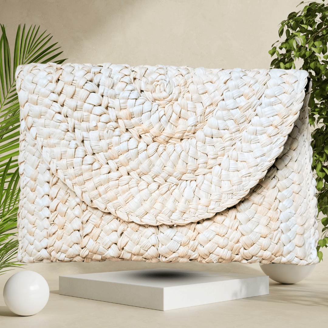 Elegant light beige handmade straw clutch bag, handcrafted with care for a minimalist yet stylish accessory for any occasion.