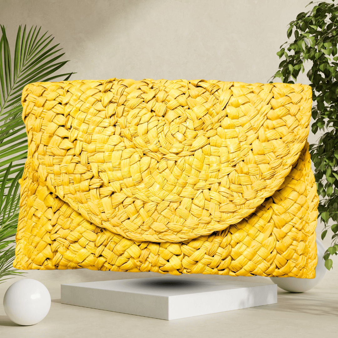 Sunny yellow handmade straw clutch bag, beautifully crafted to bring a bright, cheerful accent to your look with artisanal charm.