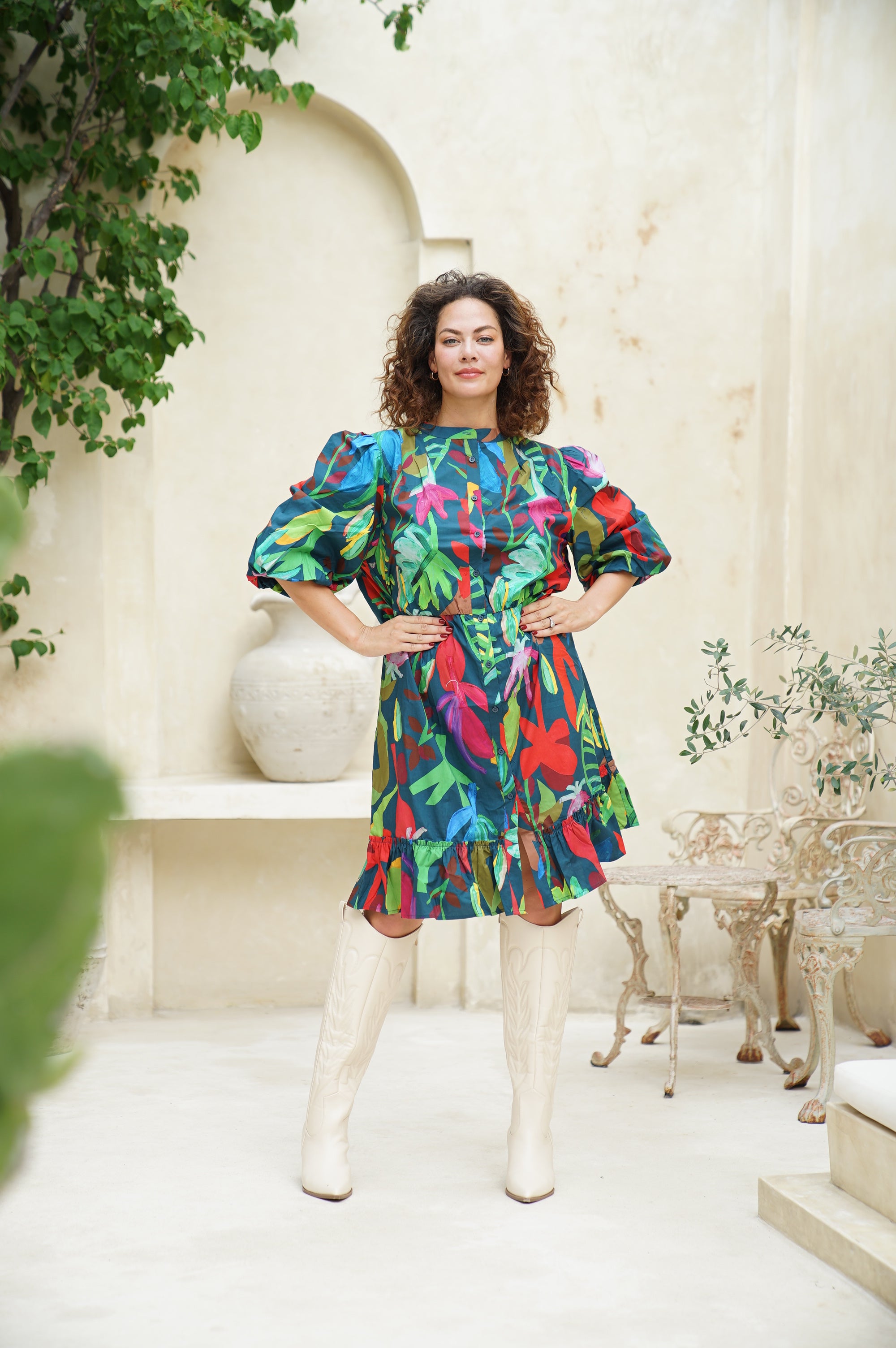 Upgrade your style with the Tropical Bloom Midi Dress. Perfect for any occasion, with vibrant prints and a flattering fit. Order now and dazzle!
