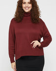 "Turtle neck bamboo jumper: Sustainable fashion for women, combining comfort and style effortlessly."