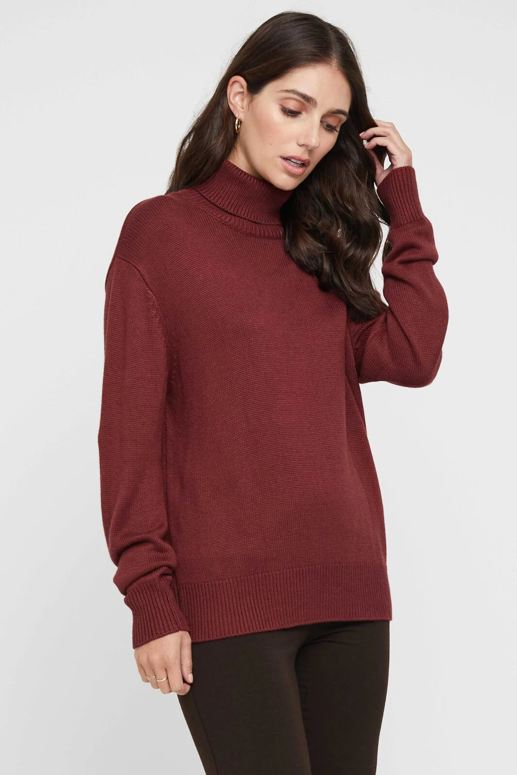 "Bamboo women's jumper: Turtle neck design offers versatility and sustainability in fashion."