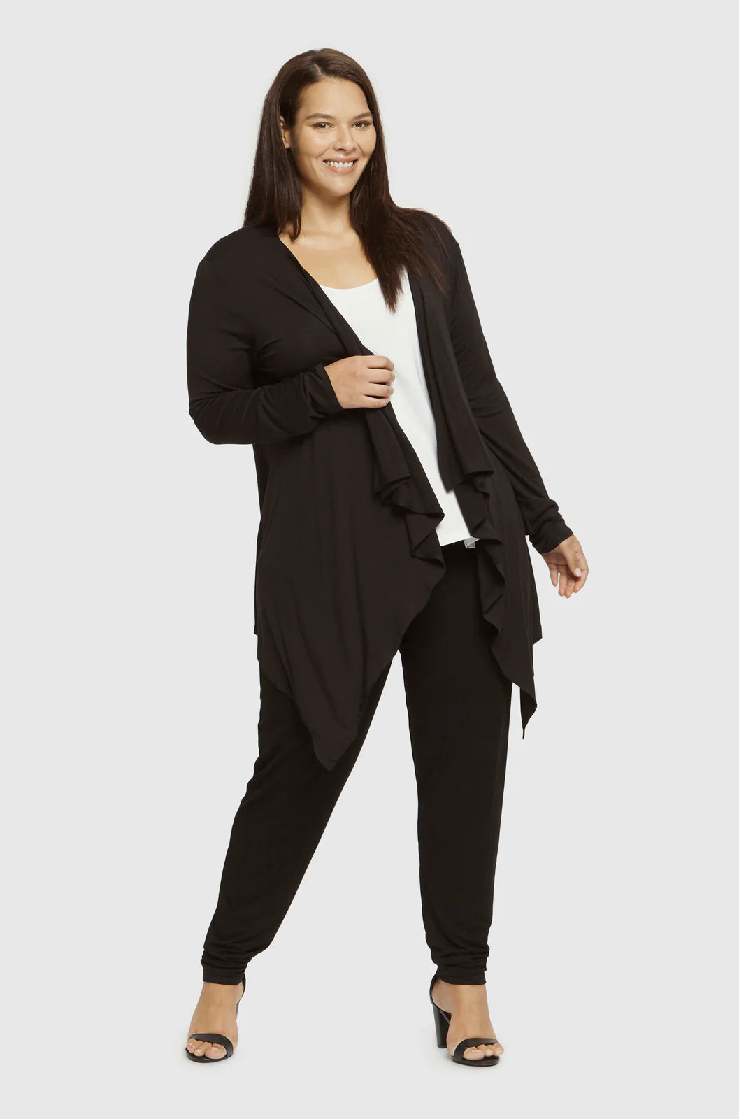 "Buttery soft bamboo cardigan in black: Sustainable style meets comfort in this elegant garment."