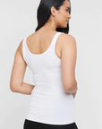 "Stylish white bamboo women's singlet: Luxurious comfort meets sustainability in everyday attire."