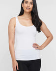 "Comfortable bamboo women's clothing: White singlet offers buttery softness and effortless style."