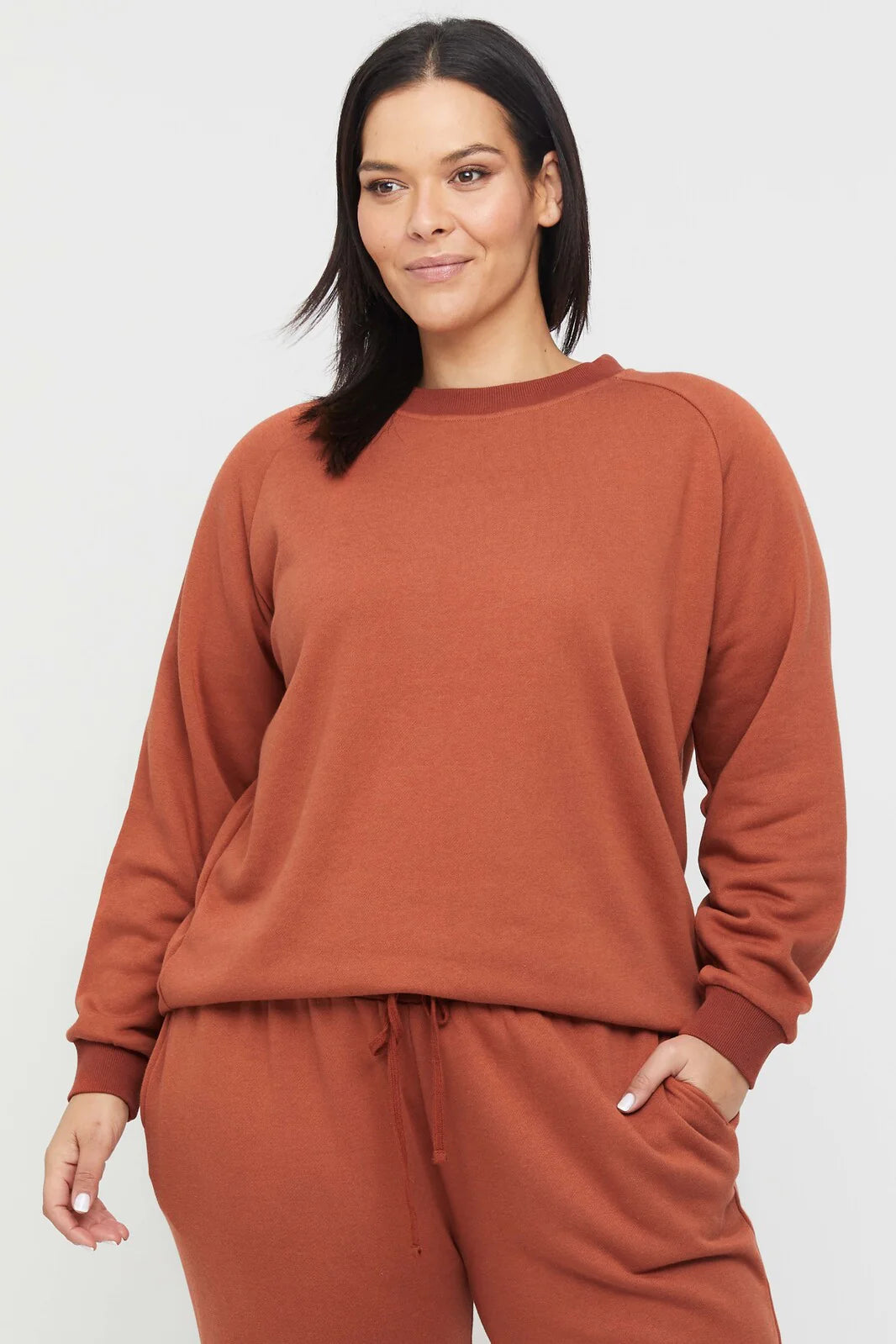 "Luxurious bamboo women's clothing: Rust jumper offers buttery softness and eco-friendly style."