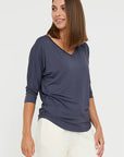 "Stylish charcoal bamboo women's top: Luxurious comfort meets sustainability in clothing."