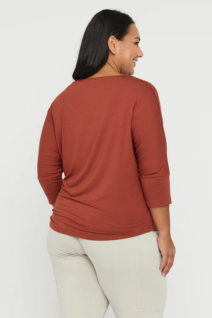 &quot;Buttery soft bamboo women&#39;s top in rust: Sustainable style with a touch of elegance and comfort.&quot;