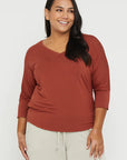 "Eco-conscious bamboo top for women: Rust hue ensures both comfort and sustainability in fashion."