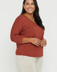 "Bamboo women's top: Stay chic and comfortable in rust, crafted from buttery soft fabric."