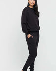 "Buttery soft bamboo women's track pants in black: Sustainable fashion for everyday elegance."